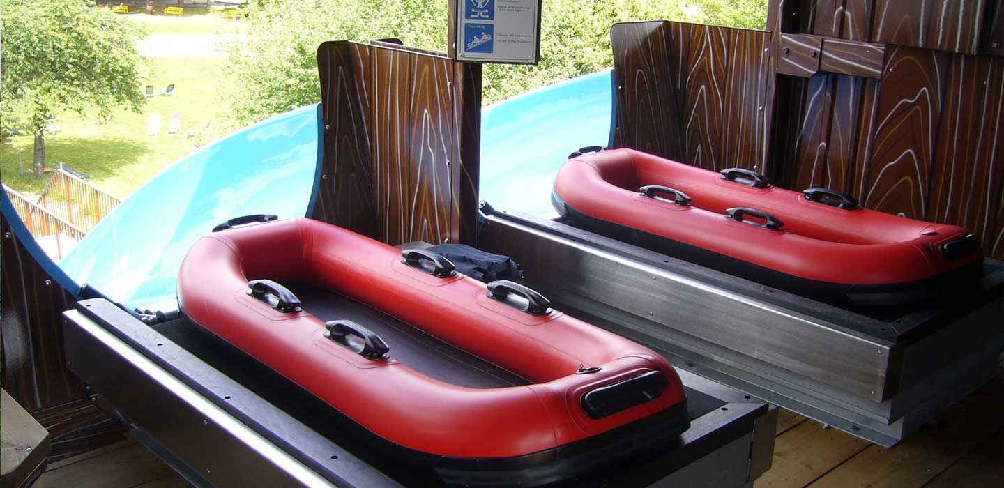 Inflatable raft slide